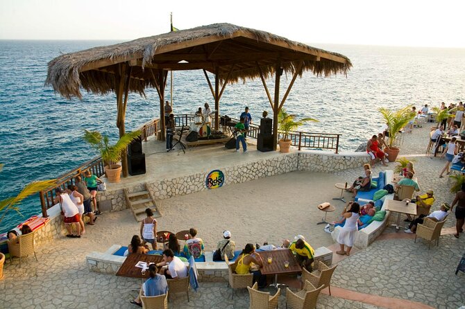 Private Negril Beach and Rick's Café from Montego Bay - Rick’s Café at sunset: live reggae and the cliff-jump spectacle